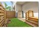 Backyard featuring a small storage unit, fence, and grass at 520 Wabash Ne Ave # B, Atlanta, GA 30312