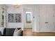 Inviting living room featuring natural light, hardwood floors, and a view to the hallway and stairs at 520 Wabash Ne Ave # B, Atlanta, GA 30312