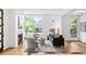 Bright and open living room features fireplace and large windows bringing the outside in at 520 Wabash Ne Ave # B, Atlanta, GA 30312