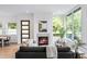 Stylish open-concept space features fireplace, sleek furnishings, and natural light at 520 Wabash Ne Ave # B, Atlanta, GA 30312