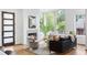 Inviting living room with fireplace and large windows, offering plenty of natural light at 520 Wabash Ne Ave # B, Atlanta, GA 30312