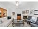 Bright living room with fireplace, neutral paint, and plenty of space for relaxing and entertaining at 1914 Lakeshore Overlook Nw Cir, Kennesaw, GA 30152
