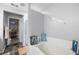 Soaking tub next to the walk-in closet offers relaxation and a spa-like experience at 212 Regent Sq, Woodstock, GA 30188