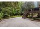 Multi-level backyard with large deck, basketball hoop and mature landscaping at 2469 Elizabeth Ann Ne Ln, Atlanta, GA 30324