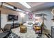 Finished basement area with seating, TV, and decorative accents for a cozy and functional living space at 2469 Elizabeth Ann Ne Ln, Atlanta, GA 30324