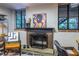 Finished basement with a brick fireplace, shelving, and exposed ducts at 2469 Elizabeth Ann Ne Ln, Atlanta, GA 30324