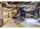 Spacious unfinished basement with exposed ductwork, stairs, and potential for storage or customization at 2469 Elizabeth Ann Ne Ln, Atlanta, GA 30324