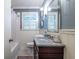 Bathroom featuring a white vanity with a marble countertop and chrome fixtures at 2469 Elizabeth Ann Ne Ln, Atlanta, GA 30324