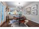 Charming dining area with a view to the kitchen, featuring stainless appliances and plenty of counter space at 2469 Elizabeth Ann Ne Ln, Atlanta, GA 30324