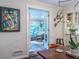 Bright dining area with kitchen view, open doors to a sunroom with plenty of natural light at 2469 Elizabeth Ann Ne Ln, Atlanta, GA 30324