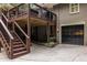 Exterior view of deck, garage and house, showing access from deck to main living area at 2469 Elizabeth Ann Ne Ln, Atlanta, GA 30324