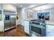 Spacious kitchen features stainless steel appliances and a modern cooktop; great for cooking enthusiasts at 2469 Elizabeth Ann Ne Ln, Atlanta, GA 30324