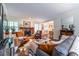 Spacious living room with a fireplace, inviting seating, and seamless flow to other living areas, creating a cozy space at 2469 Elizabeth Ann Ne Ln, Atlanta, GA 30324