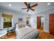 Bedroom boasting a ceiling fan, natural light, and hardwood floors at 416 2Nd Ave, Decatur, GA 30030