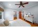 Bedroom featuring a ceiling fan, hardwood floors, and a vintage dresser at 416 2Nd Ave, Decatur, GA 30030
