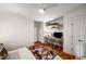 Bright bedroom features hardwood floors, bright natural light, and built in desk at 416 2Nd Ave, Decatur, GA 30030