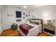 Cozy bedroom features hardwood floors, bright natural light, and modern decor at 416 2Nd Ave, Decatur, GA 30030