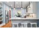 Bright kitchen featuring granite countertops, stainless steel appliances, and modern lighting at 416 2Nd Ave, Decatur, GA 30030