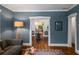 Inviting living room with hardwood floors, stylish furnishings, and an open doorway at 416 2Nd Ave, Decatur, GA 30030