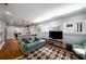 Cozy living area with modern furnishings, seamless kitchen access, and ample natural light at 416 2Nd Ave, Decatur, GA 30030
