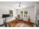 Office features hardwood floors, bright natural light, and fireplace at 416 2Nd Ave, Decatur, GA 30030