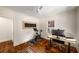 Office features hardwood floors, bright natural light, and simple decor at 416 2Nd Ave, Decatur, GA 30030