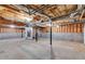 Unfinished basement featuring concrete flooring, cinder block walls and exposed ceiling joists ready to be customized at 1094 Plantation Ct, Villa Rica, GA 30180