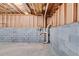 Spacious unfinished basement with concrete flooring and cinder block walls awaiting customization and finishing touches at 1094 Plantation Ct, Villa Rica, GA 30180