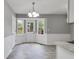 Eat-in kitchen with gray walls, granite counters, and a door leading outside at 1094 Plantation Ct, Villa Rica, GA 30180
