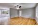 Spacious living room featuring hardwood floors, neutral paint, and ample natural light at 1094 Plantation Ct, Villa Rica, GA 30180