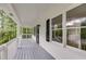 Inviting covered porch with white railings and ample space for outdoor seating at 1094 Plantation Ct, Villa Rica, GA 30180