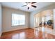 Open living space with hardwood floors, arched entryway, and an abundance of natural light at 4050 Old Fairburn Rd, Atlanta, GA 30349