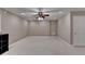 Large open carpeted basement area at 4490 Highway 138 Sw, Stockbridge, GA 30281