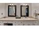 Bright bathroom features double sinks, updated fixtures, and plenty of cabinet space at 4490 Highway 138 Sw, Stockbridge, GA 30281