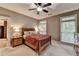Cozy bedroom features neutral walls, carpet floors, and plenty of natural light at 4490 Highway 138 Sw, Stockbridge, GA 30281
