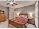 Bright bedroom features neutral walls, carpet floors, a ceiling fan and natural light at 4490 Highway 138 Sw, Stockbridge, GA 30281