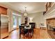 Dining room with fireplace and patio access at 4490 Highway 138 Sw, Stockbridge, GA 30281