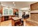 Bright kitchen featuring granite countertops, stainless steel appliances, and eat-in island at 4490 Highway 138 Sw, Stockbridge, GA 30281