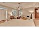 Spacious living room with neutral colors, large windows, and ample natural light at 4490 Highway 138 Sw, Stockbridge, GA 30281