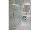 Elegant bathroom featuring a glass shower, soaking tub, and marble accents at 503 Glendale Rd, Scottdale, GA 30079