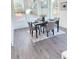 Dining room features a modern table with gray chairs and large windows for natural light at 503 Glendale Rd, Scottdale, GA 30079