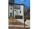 Modern two-story home with black trimmed windows and a black garage door at 503 Glendale Rd, Scottdale, GA 30079