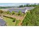 This is an aerial view of homes surrounded by green space at 5695 Overlook Station Dr, Suwanee, GA 30024