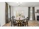 Eat-in dining area with hardwood floors, windows, sliding door to the outside at 1180 Trident Maple, Lawrenceville, GA 30045