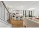Open concept kitchen and living room featuring a bar area at 1180 Trident Maple, Lawrenceville, GA 30045
