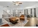 Spacious open concept living room and kitchen with hardwood floors at 1180 Trident Maple, Lawrenceville, GA 30045