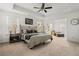 Main bedroom with a ceiling fan, and large windows at 1180 Trident Maple, Lawrenceville, GA 30045