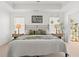 Large main bedroom with ceiling fan, dual windows, and hardwood floors at 1180 Trident Maple, Lawrenceville, GA 30045