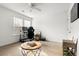 Bright room with natural light, desk, chair, and coffee table at 1180 Trident Maple, Lawrenceville, GA 30045