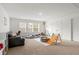 Spacious playroom filled with toys, a ball pit, and comfortable seating for endless fun and activities at 1180 Trident Maple, Lawrenceville, GA 30045